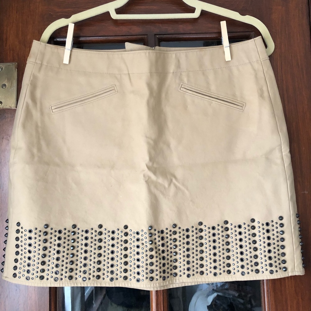COACH tan mini skirt with grommets